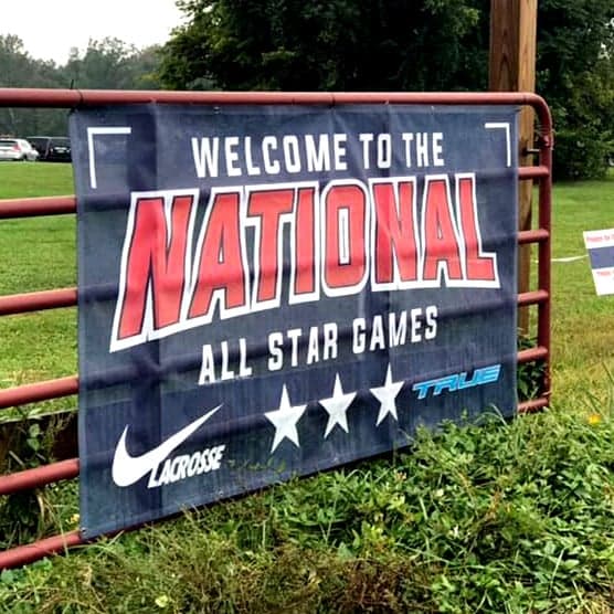 National All Star Games vinyl banner hung on a gate